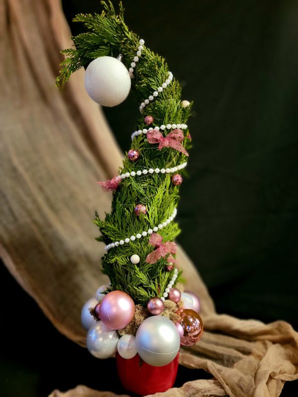 Elegant Grinch Tree with an assortment of different sized baubles. 